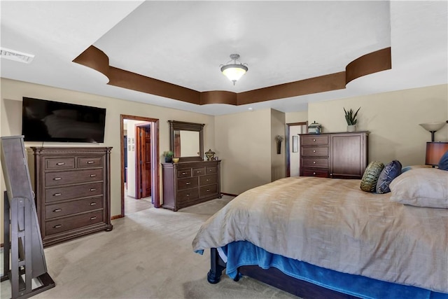 245 Shaw Ct, Salem Twp Wml, PA 15670 - bedroom with a raised ceiling and light carpet