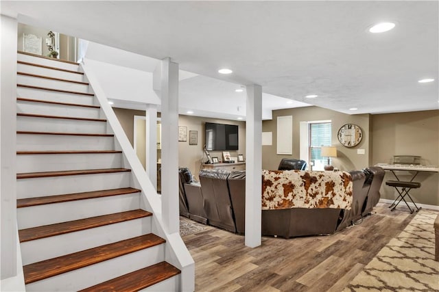 245 Shaw Ct, Salem Twp Wml, PA 15670 - living room featuring wood finished floors, recessed lighting, and stairway
