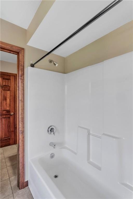 245 Shaw Ct, Salem Twp Wml, PA 15670 - bathroom featuring bathtub / shower combination and tile patterned flooring