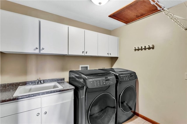 245 Shaw Ct, Salem Twp Wml, PA 15670 - laundry area featuring cabinet space, washer and dryer, and light tile patterned floors