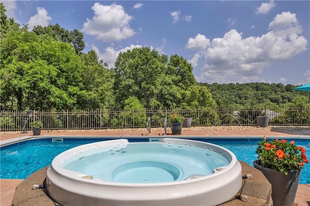 245 Shaw Ct, Salem Twp Wml, PA 15670 - view of swimming pool with a wooded view