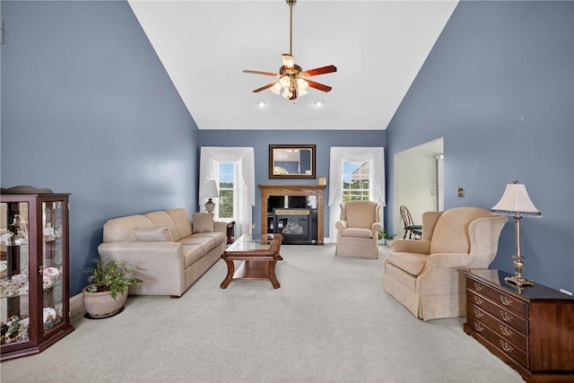 260 Arrowhead Ln, Nottingham, PA 15330 - carpeted living area with a ceiling fan, high vaulted ceiling, and a glass covered fireplace