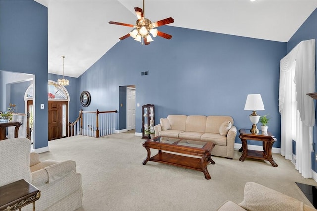 260 Arrowhead Ln, Nottingham, PA 15330 - living room featuring high vaulted ceiling, light carpet, ceiling fan, and a chandelier