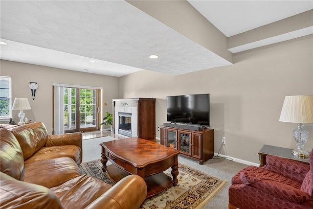 260 Arrowhead Ln, Nottingham, PA 15330 - living room featuring light carpet, a tile fireplace, and recessed lighting