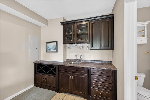 260 Arrowhead Ln, Nottingham, PA 15330 - indoor wet bar with electric panel and light tile patterned flooring