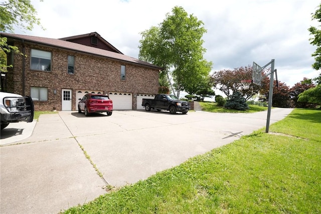 434 Bocktown Cork Rd, Independence Bea, PA 15026 - view of home's exterior featuring concrete driveway, an attached garage, a yard, and brick siding