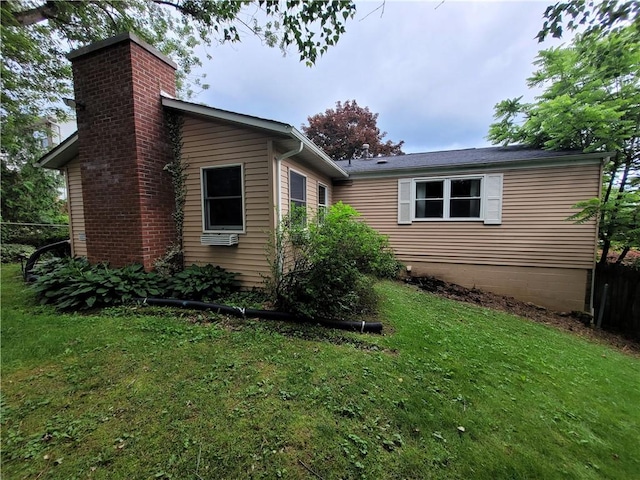 314 Wren Dr, Hempfield Twp Wml, PA 15601 - view of side of home with a chimney