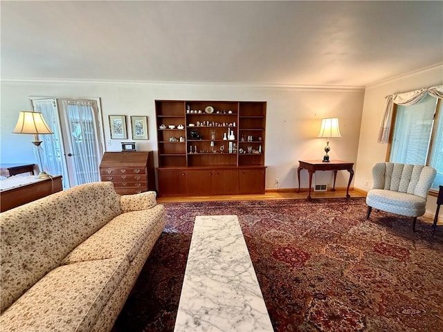 1180 Sunset Dr, Latrobe, PA 15650 - living area with crown molding and wood finished floors