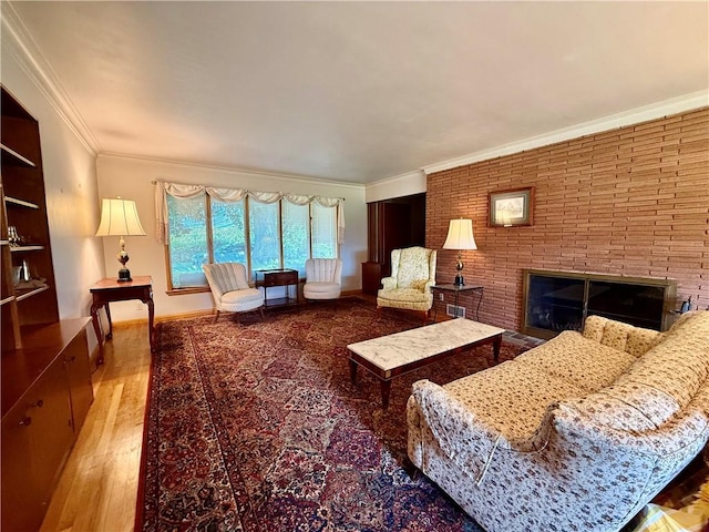 1180 Sunset Dr, Latrobe, PA 15650 - living area featuring ornamental molding, wood finished floors, and a brick fireplace