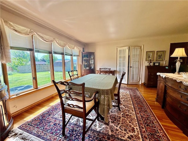 1180 Sunset Dr, Latrobe, PA 15650 - dining area featuring ornamental molding and light wood-style flooring