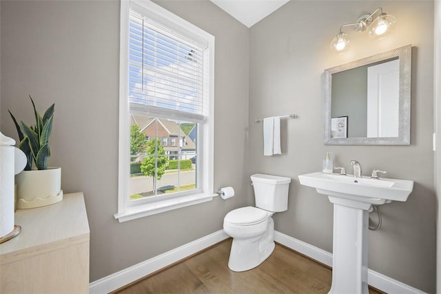 2123 Westcott Ln, South Fayette, PA 15017 - half bathroom featuring baseboards and wood finished floors