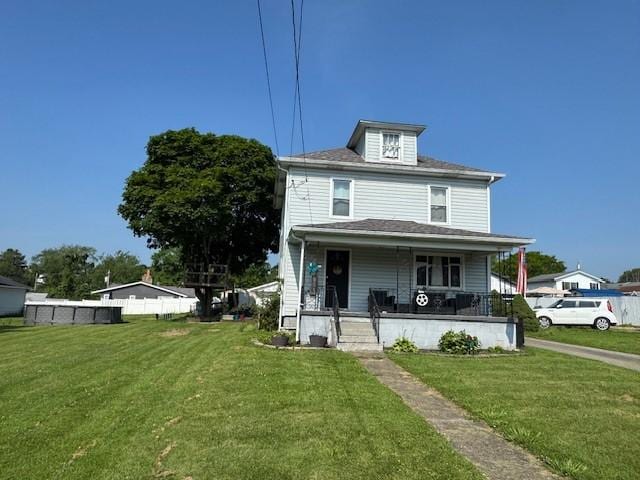 909 N Hickory St, Scottdale, PA 15685 - american foursquare style home featuring covered porch