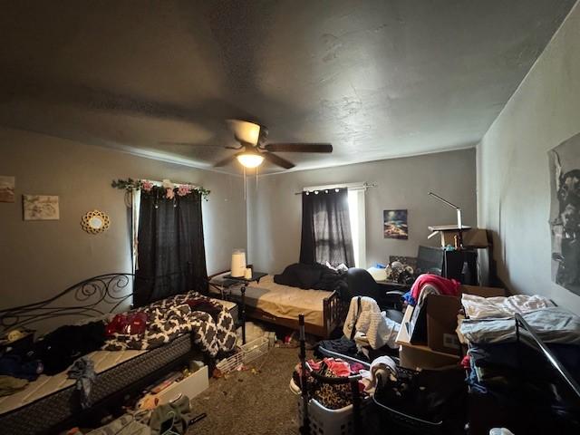 909 N Hickory St, Scottdale, PA 15685 - carpeted bedroom with ceiling fan