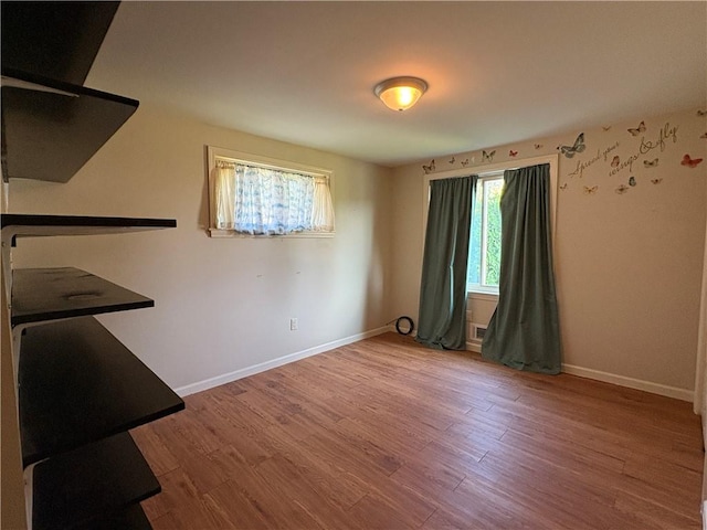 111 Hemlock Ln, Monroeville, PA 15146 - empty room featuring baseboards and wood finished floors