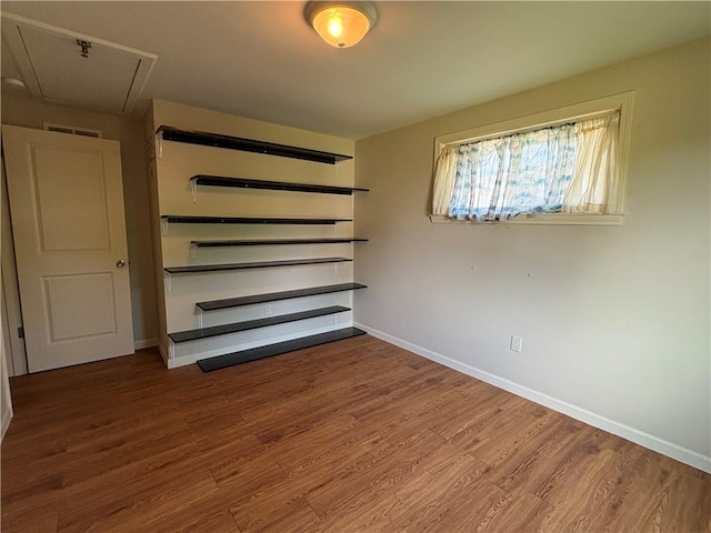 111 Hemlock Ln, Monroeville, PA 15146 - unfurnished bedroom featuring baseboards and wood finished floors
