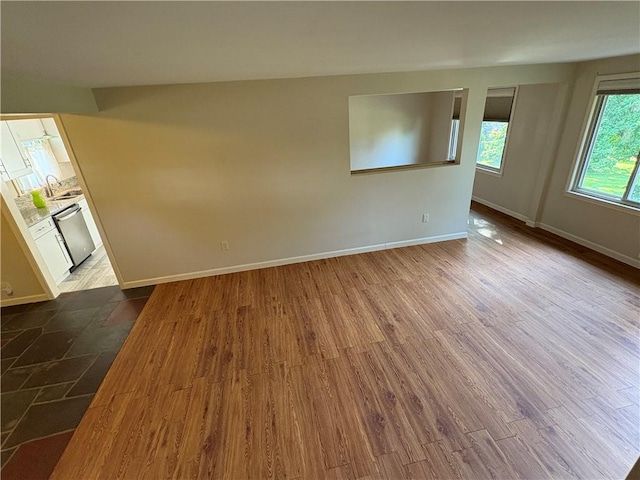 111 Hemlock Ln, Monroeville, PA 15146 - unfurnished room featuring baseboards and dark wood-type flooring