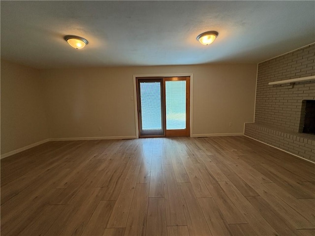111 Hemlock Ln, Monroeville, PA 15146 - unfurnished living room with baseboards and wood finished floors