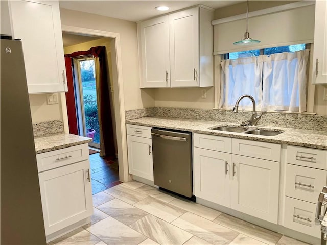 111 Hemlock Ln, Monroeville, PA 15146 - kitchen featuring stainless steel appliances, white cabinets, light stone counters, and recessed lighting