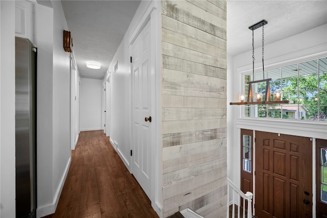 108 Heather Dr, Center Twp Bea, PA 15061 - corridor with dark wood-style floors, a textured ceiling, and a chandelier
