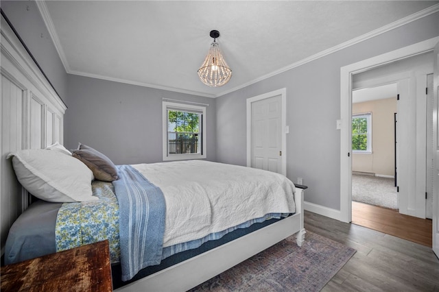 108 Heather Dr, Center Twp Bea, PA 15061 - bedroom featuring crown molding, a chandelier, and dark wood-style flooring
