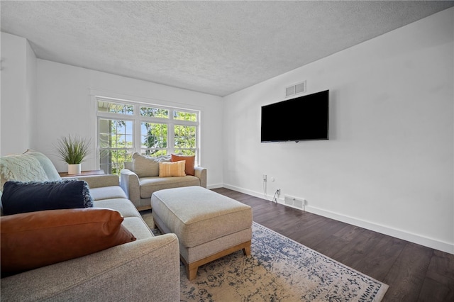 108 Heather Dr, Center Twp Bea, PA 15061 - living room with wood finished floors and a textured ceiling