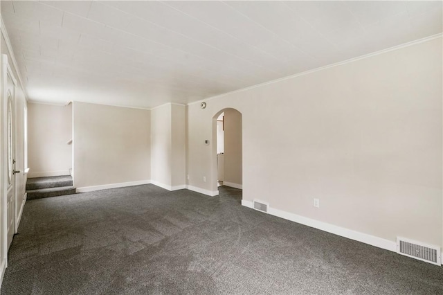 1029 Nimick Ave, Monaca, PA 15061 - unfurnished room with dark carpet, arched walkways, and ornamental molding