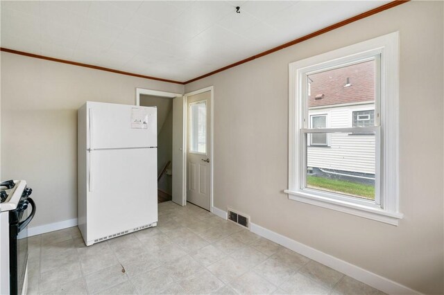 1029 Nimick Ave, Monaca, PA 15061 - kitchen featuring white appliances, ornamental molding, and healthy amount of natural light