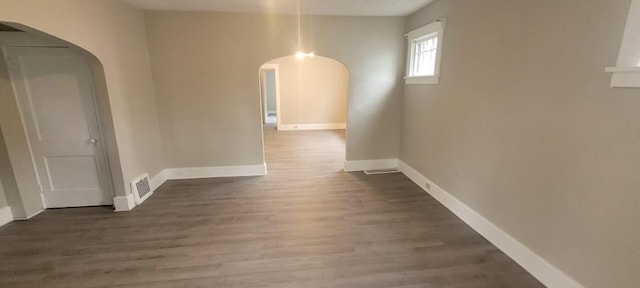 304 Elm Ave, Sharon, PA 16146 - corridor with arched walkways and wood finished floors