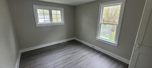 304 Elm Ave, Sharon, PA 16146 - spare room featuring baseboards and dark wood-style flooring