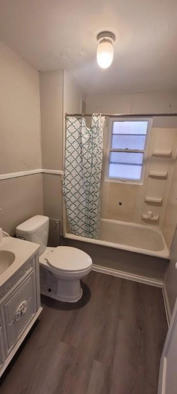 304 Elm Ave, Sharon, PA 16146 - full bath featuring vanity, wood finished floors, and shower / bath combination with curtain