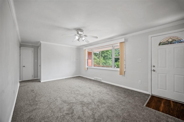 11256 Azalea Dr, Penn Hills, PA 15235 - foyer entrance featuring ceiling fan, carpet flooring, and ornamental molding