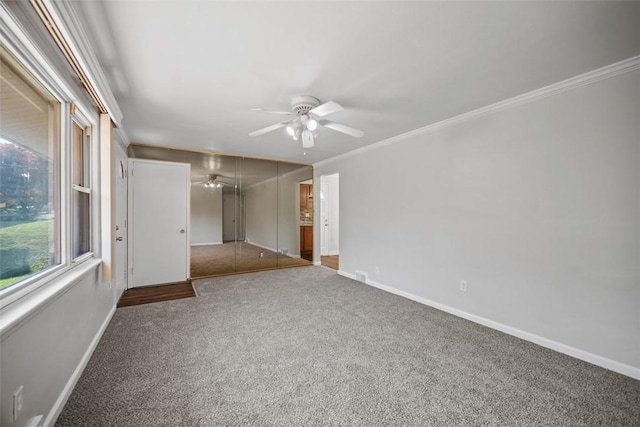 11256 Azalea Dr, Penn Hills, PA 15235 - carpeted empty room with a ceiling fan and crown molding