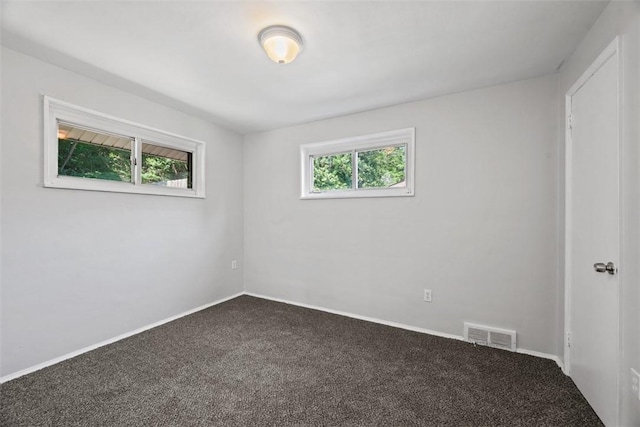 11256 Azalea Dr, Penn Hills, PA 15235 - unfurnished room featuring dark carpet and baseboards