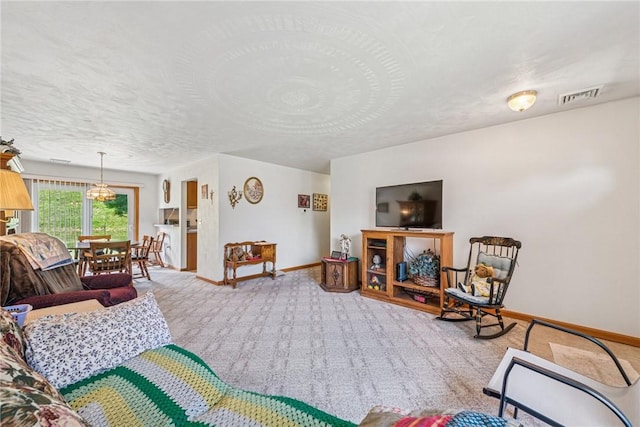 1480 Spring Crest Cir, Derry Twp, PA 15650 - living area with carpet and a textured ceiling