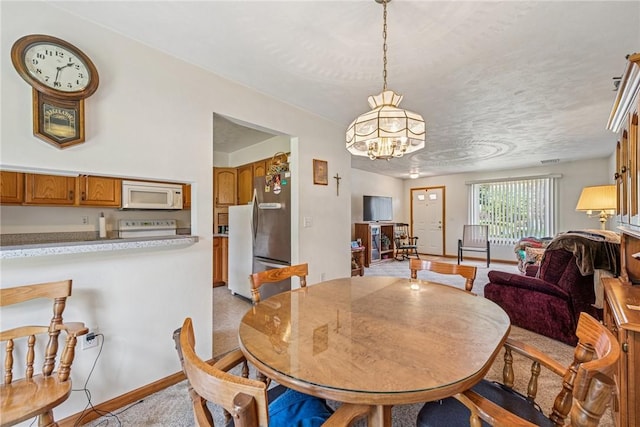 1480 Spring Crest Cir, Derry Twp, PA 15650 - dining room featuring a chandelier and baseboards