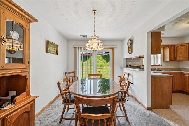 1480 Spring Crest Cir, Derry Twp, PA 15650 - dining room featuring a chandelier and light colored carpet