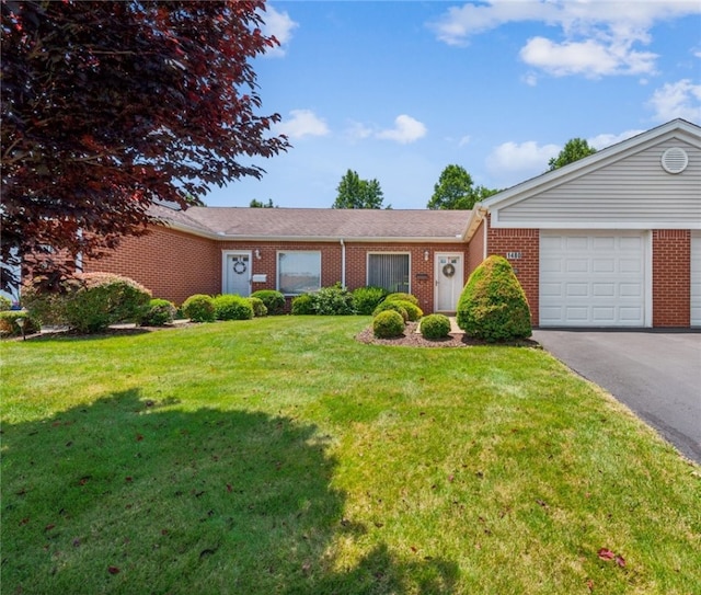 1480 Spring Crest Cir, Derry Twp, PA 15650 - ranch-style house with brick siding, a front lawn, driveway, and a garage