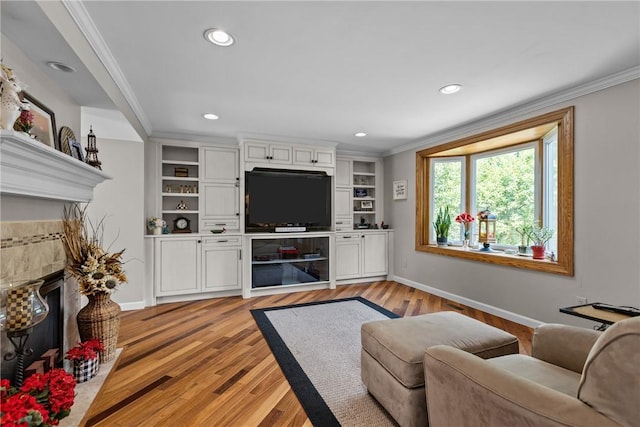 859 Boulder Dr, Bethel Park, PA 15102 - living room with a fireplace, ornamental molding, light wood-type flooring, and recessed lighting