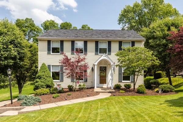 859 Boulder Dr, Bethel Park, PA 15102 - colonial house featuring a front lawn