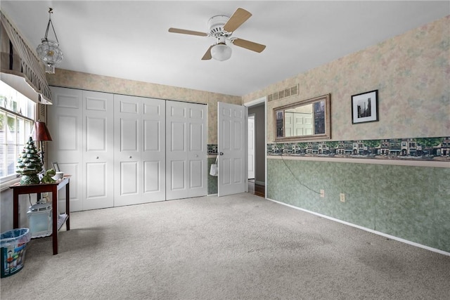 859 Boulder Dr, Bethel Park, PA 15102 - unfurnished bedroom featuring wallpapered walls, carpet, a closet, and ceiling fan