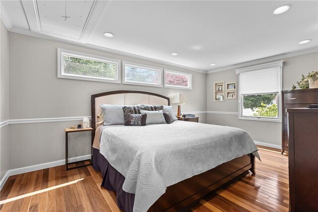 859 Boulder Dr, Bethel Park, PA 15102 - bedroom featuring multiple windows, wood finished floors, ornamental molding, and recessed lighting