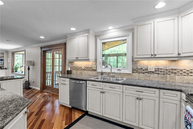 859 Boulder Dr, Bethel Park, PA 15102 - kitchen featuring stainless steel dishwasher, crown molding, wood finished floors, white cabinetry, and healthy amount of natural light