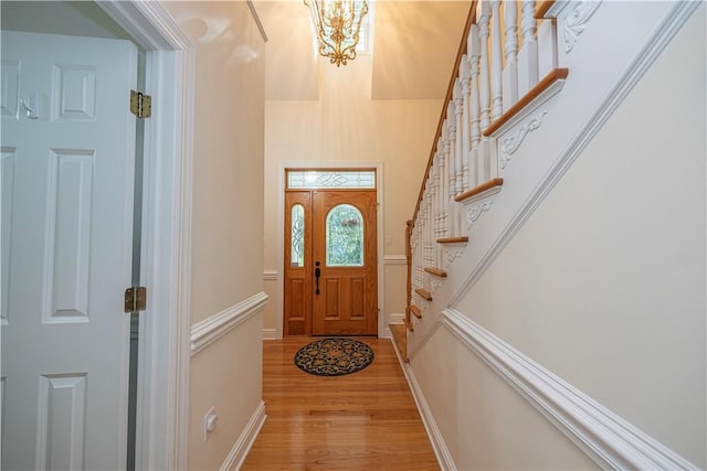 503 Sharon Rd, Moon/Crescent Twp, PA 15108 - entrance foyer featuring light wood-style floors, stairs, and a chandelier