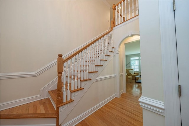 503 Sharon Rd, Moon/Crescent Twp, PA 15108 - stairway featuring wood finished floors and arched walkways
