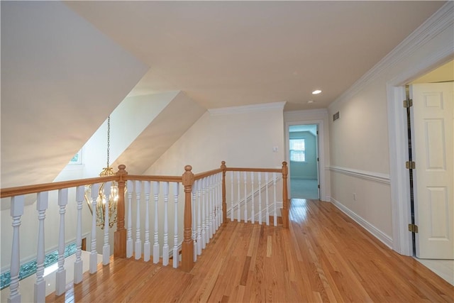 503 Sharon Rd, Moon/Crescent Twp, PA 15108 - corridor featuring wood finished floors, an upstairs landing, ornamental molding, and recessed lighting