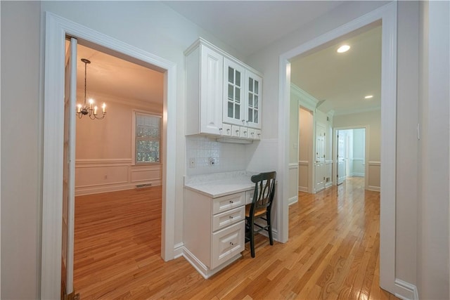 503 Sharon Rd, Moon/Crescent Twp, PA 15108 - hallway featuring crown molding, light wood finished floors, a chandelier, a desk, and recessed lighting