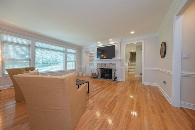 503 Sharon Rd, Moon/Crescent Twp, PA 15108 - living area with ornamental molding, a fireplace, and light wood finished floors