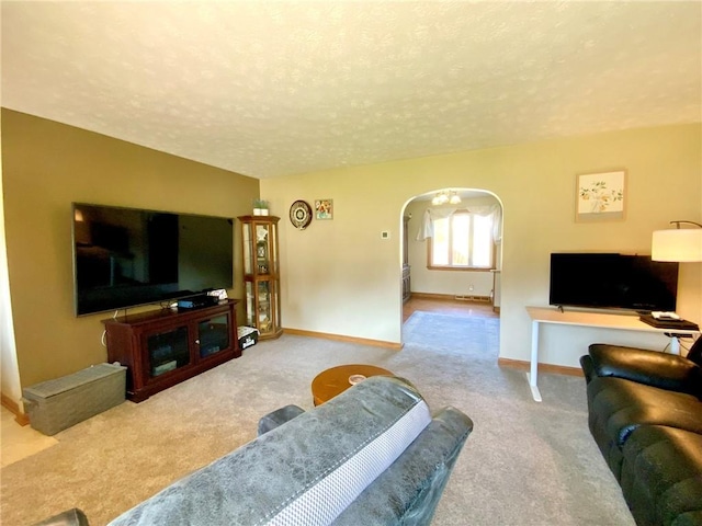 224 Fairview Rd, Ohioville, PA 15059 - carpeted living room with arched walkways and a textured ceiling
