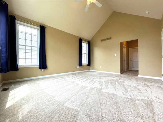 261 Patriot Ln, Economy, PA 15042 - spare room featuring ceiling fan, light carpet, high vaulted ceiling, and healthy amount of natural light