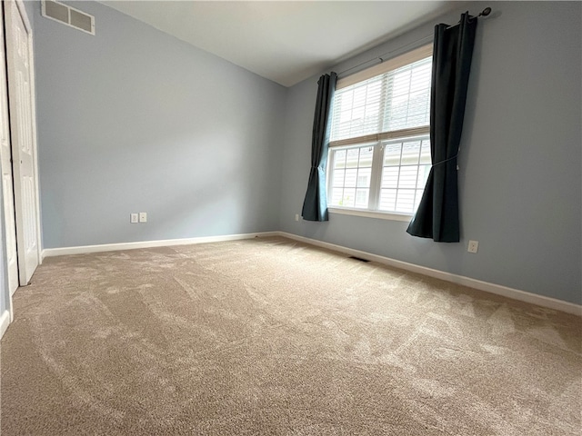 261 Patriot Ln, Economy, PA 15042 - spare room featuring carpet floors and lofted ceiling